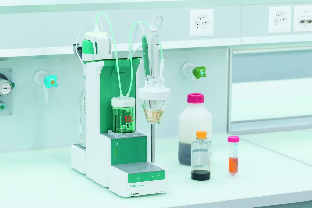 Automated titration unit with reagent bottles in an analytical laboratory